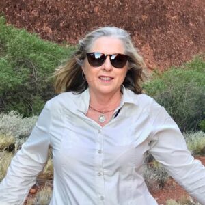 Michelle is standing facing the camera in Walpa Gorge at Kata Tjuta